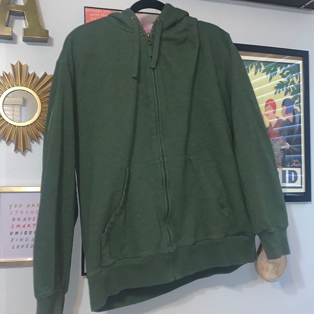Green hoodie w/ brown interior.